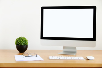 computer screen PC and White Coffee Cup for business on the table