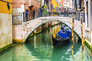 canals with gondolas in Venice
