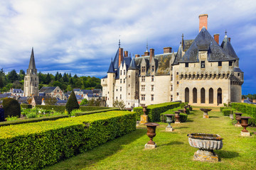 Famous castles of Loire valley - impressive Langeais with beautiful gardens. France