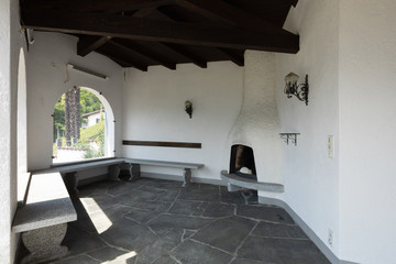 Outdoor veranda with large arches