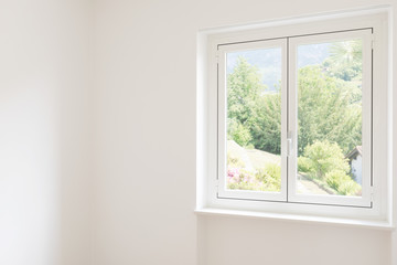 Detail of a window in a white room