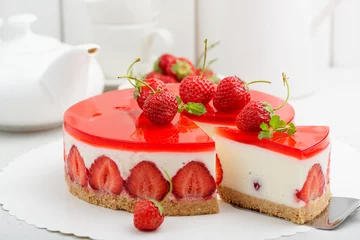 Fotobehang Cold cheesecake with strawberry and strawberry jelly. © Nelea Reazanteva