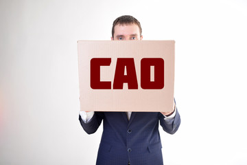 The businessman is holding a box with the inscription:CAO