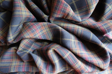 Wrinkled thick plaid fabric  in subdued colors