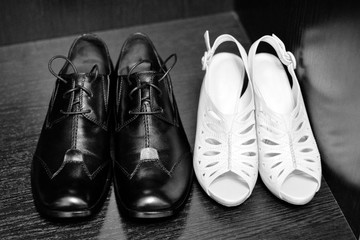 Black male and white female summer shoes.