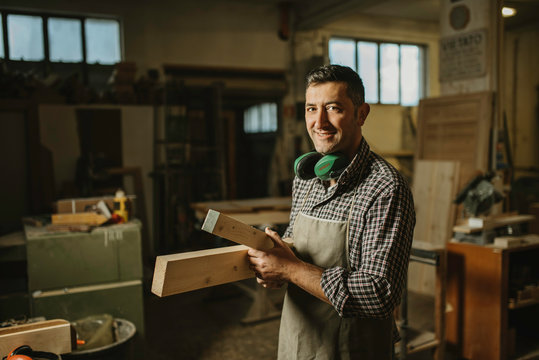 Image of mature carpenter in the workshop