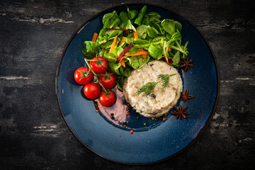 risotto with fresh cream, salted chicken, rehydrated ceps and mushrooms