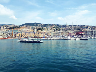 Fototapeta na wymiar Genoa port blue sea view with yachts