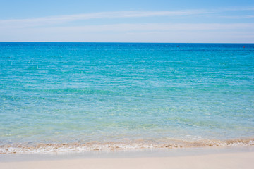 Fototapeta na wymiar White sand and turquoise water in Le Bombarde beach