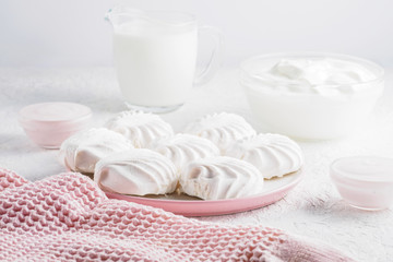 Protein products ingredients for breakfast marshmallows sour cream yogurt milk piece of bread green tea