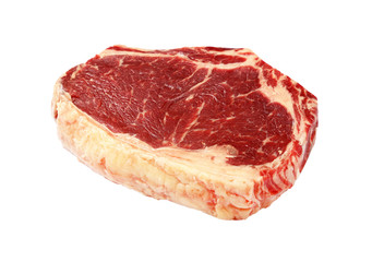 Close up raw beef ribeye steak isolated on white