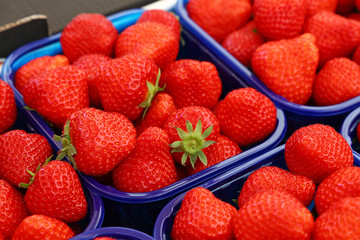 Close up red ripe strawberry on retail display