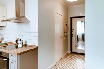 Scandinavian interior design. White grey kitchen room organization