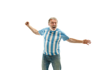 The Argentinean soccer fan celebrating on white background