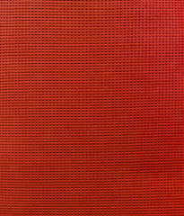 Synthetic fabric red background