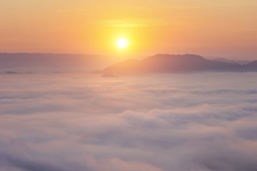 Fototapeta na wymiar Mountain Mist in sunrise,mist on sunrise,mist over mountain during sunrise