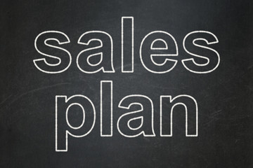 Marketing concept: text Sales Plan on Black chalkboard background