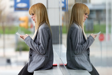 Young beautiful woman talking on phone