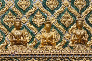 Fototapeta na wymiar Mosaic encrusted wall of the Phra Mondop library building on the grounds of the Grand Palace Bangkok Thailand.