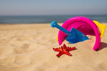 Fototapeta na wymiar toys on a sunny beach