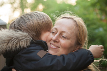 Mother hugging her son