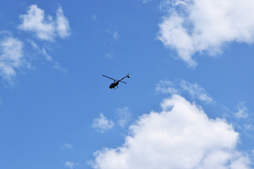 Fototapeta na wymiar helicopter on the sky