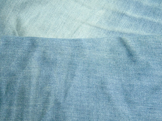Texture of blue jeans background, space of empty light blue natural clean denim.