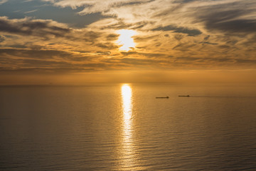 Naklejka premium Sunset over the Ocean along the Cape Peninsula, South Afrcia