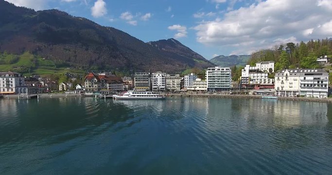 Brunnen waterfront with leaving ship