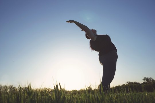 Body Positive, Yoga, Confidence, Freedom. Overweight Woman Practicing Yoga Outdoors. Obesity, Wellness Outdoor Activity And Health