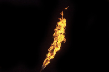 Fire, flame on a black background. Fire for advertising. An unusual game of bright red and yellow colors.