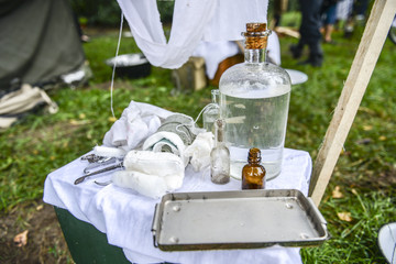 Medical devices from World War II during historical reconstruction.