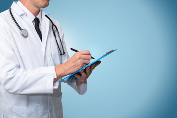Doctor holding a clipboard with blank on a blue background