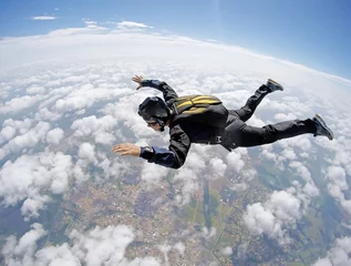 Fototapeten Fallschirmspringer Wolkengebilde © Mauricio G