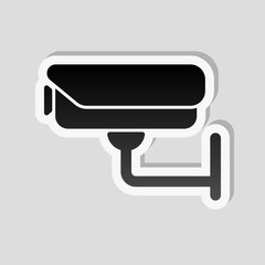Security camera. Technology icon. Sticker style with white borde