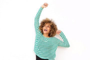 young black woman cheering with arm raised