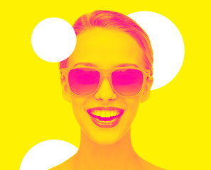 happiness and people concept - portrait of happy amazed teenage girl in sunglasses, trendy duotone effect