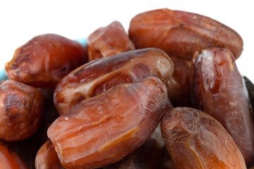 Close up of date fruit on white background