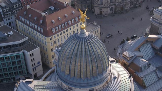 Aerial Drone 4k - Art academy in Dresden Germany Fama Gold Figure - flying forwards to building 