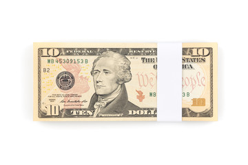 Stack of ten US dollar bills isolated on white background.