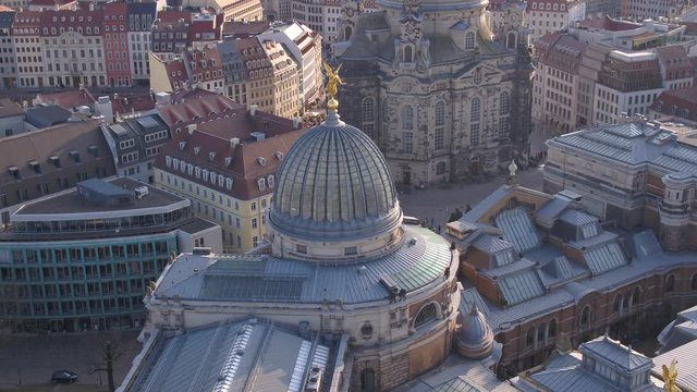 Aerial Drone 4k - Art academy in Dresden Germany Fama Gold Figure - flying forwards to building 