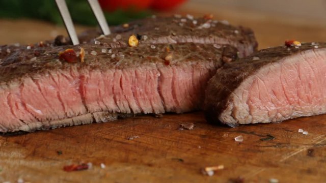  beef steak cooked medium well cut sliced knife
