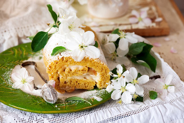 Obraz na płótnie Canvas Cinnamon Apple Cake Roll with cream cheese