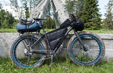 Fototapeta na wymiar Tourist fatbike with bikepacking