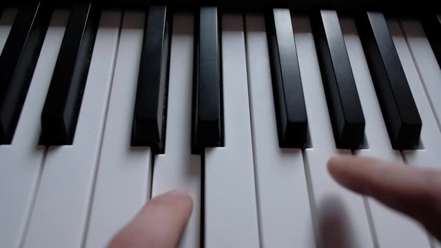 timelapse - Musician playing on musical keyboard. Close up.