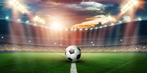 Stadium in the lights and flashes, football field. Concept sports background, football, night stadium. Mixed media, copy space. © Aliaksandr Marko