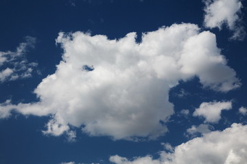 stratocumulus clouds and the dark blue sky