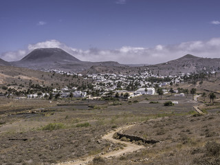 View of Haria village at the foot of a volcano, Lanzarote, Canary Islands, Spain