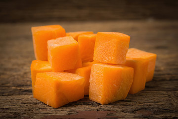 Carrot cube on old wood
