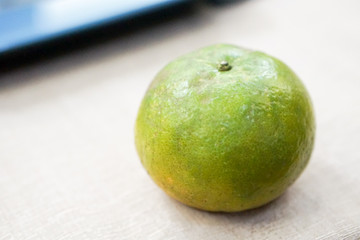 Close up tangerine on the gray table